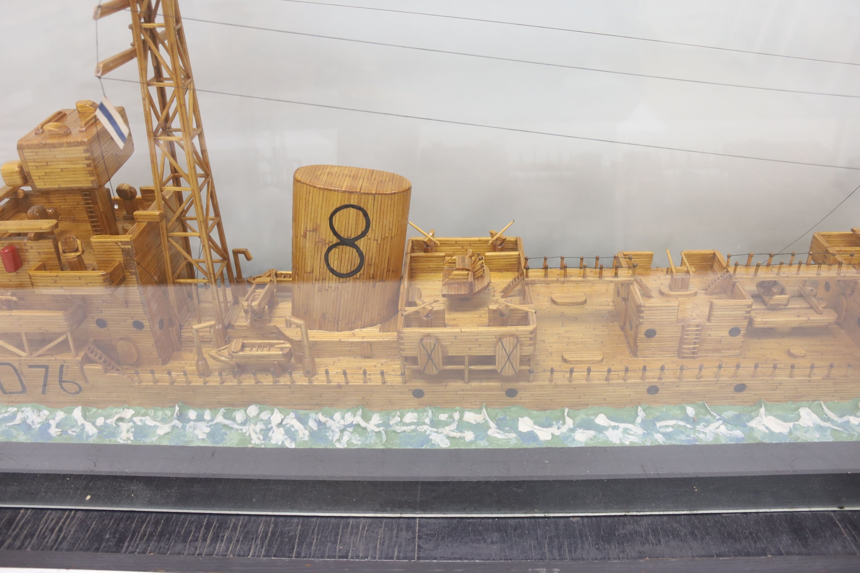 A large scratch built model of the destroyer HMS Consort (D76) made entirely out of matches, cased, 159cm total length